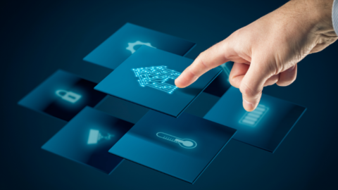 A man’s hand is pointing at icons in the app marketplace. - JacRox