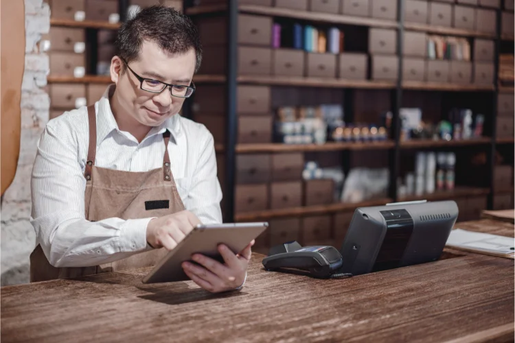 A small business owner using accounting software - JacRox