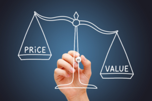 Scales balancing the terms 'price' and 'value'