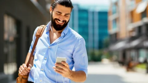 Businessperson using their phone - JacRox