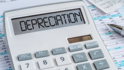 A calculator displaying the word ‘depreciation’. - JacRox